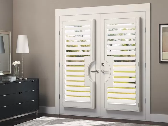 Heritance® Hardwood Shutters on a French Door.